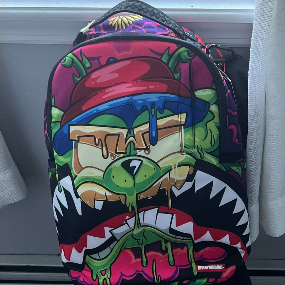 Sprayground Bold Graphic Backpack with Red and Green Accents barely used